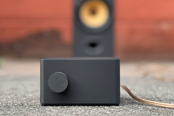 This battery-powered amp that turns any analog speaker into a portable Bluetooth speaker is bonkers, but I love it